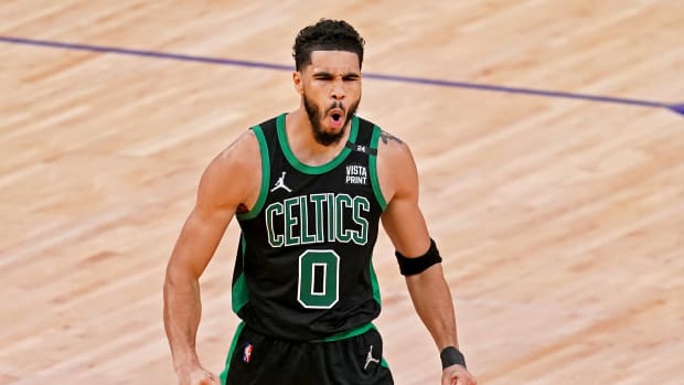 Jayson Tatum celebrates during a game.
